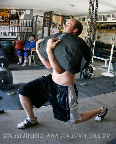 Iceburg sandbag Zercher lunges - Olympic Weightlifting, strength, conditioning, fitness, nutrition - Catalyst Athletics 